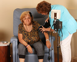 Nurse taking blood pressure